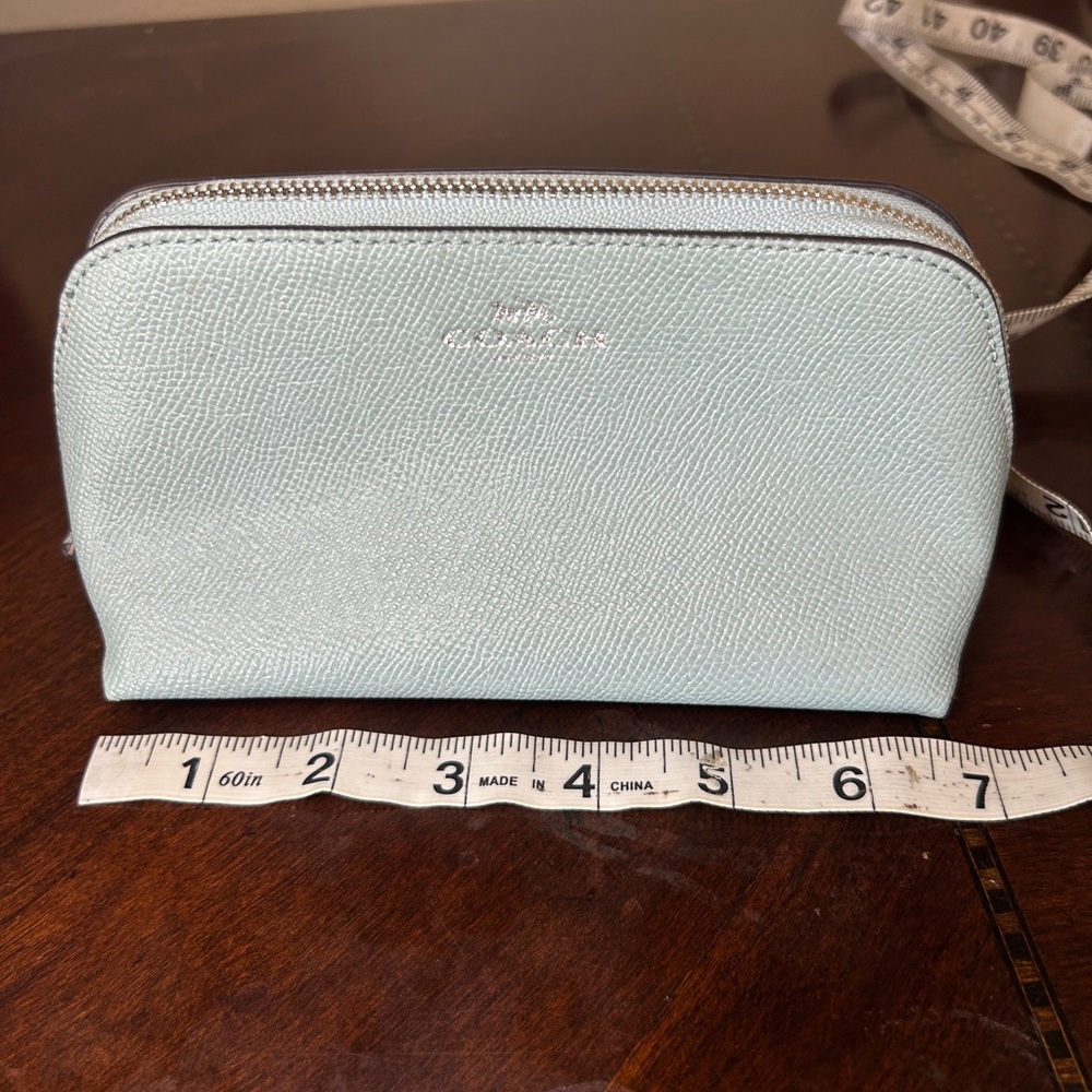 Light Blue Coach travel pouch